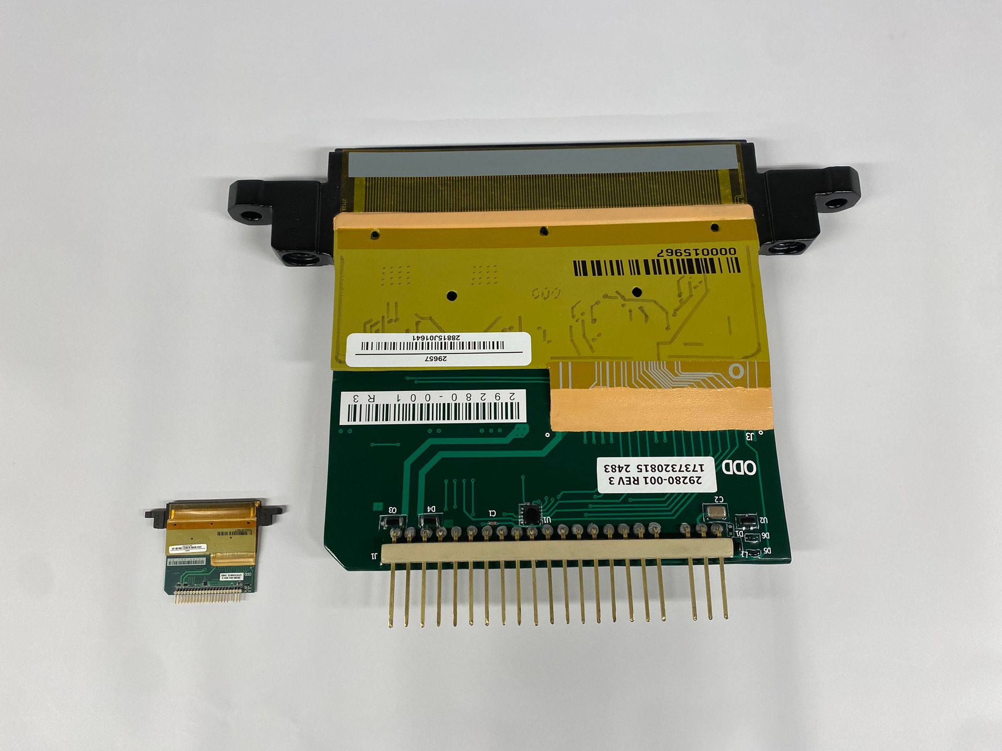 Enlarged 3D-printed reproduction of a Digital Dot printhead with original next to it.