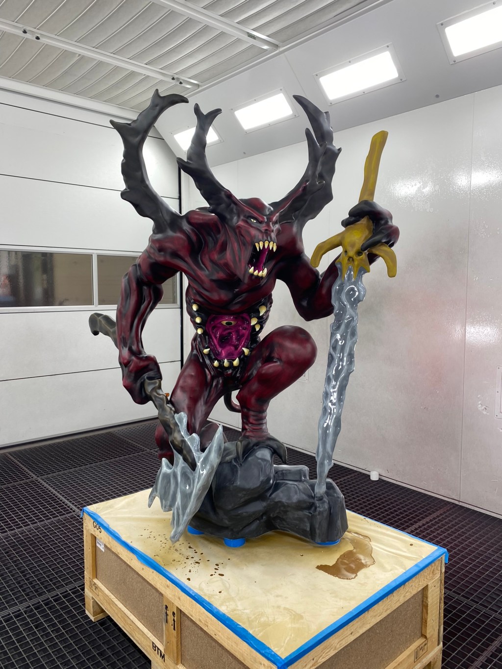 Large 3D-printed demon sculpture with detailed paintwork and finishing touches
