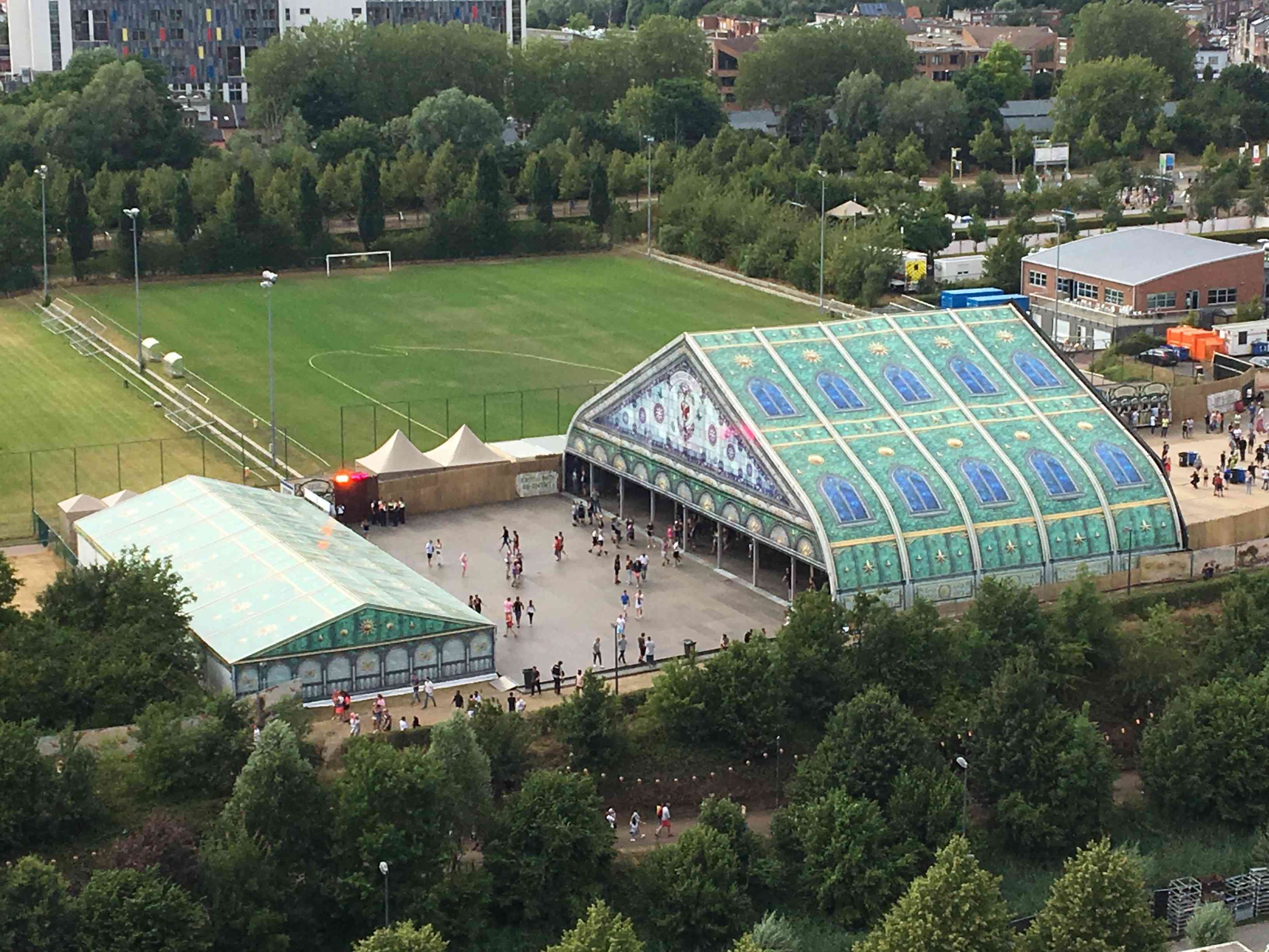 Aerial view of the tent structure at Tomorrowland entrance with double-sided full-color tarp design