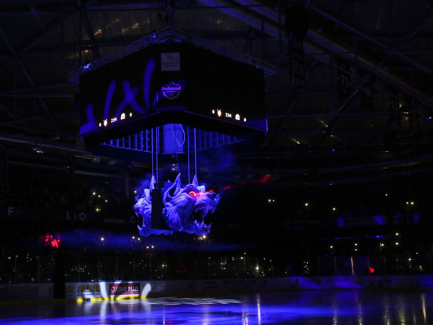 Lightweight sculptural wolf heads for Grenoble hockey team, featuring laser effects and suspended from the ceiling